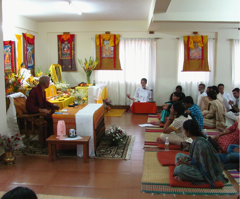 The main shrine room of Mati Bhadra Sagara, decorated with thangkas and offerings